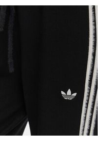Adidas - adidas Spodnie dresowe Firebird KS9363 Czarny Regular Fit. Kolor: czarny. Materiał: syntetyk #4