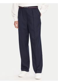 Lacoste Spodnie materiałowe HF5307 Granatowy Relaxed Fit. Kolor: niebieski. Materiał: syntetyk