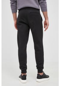 Calvin Klein Jeans Spodnie męskie kolor czarny z nadrukiem. Kolor: czarny. Materiał: dzianina. Wzór: nadruk