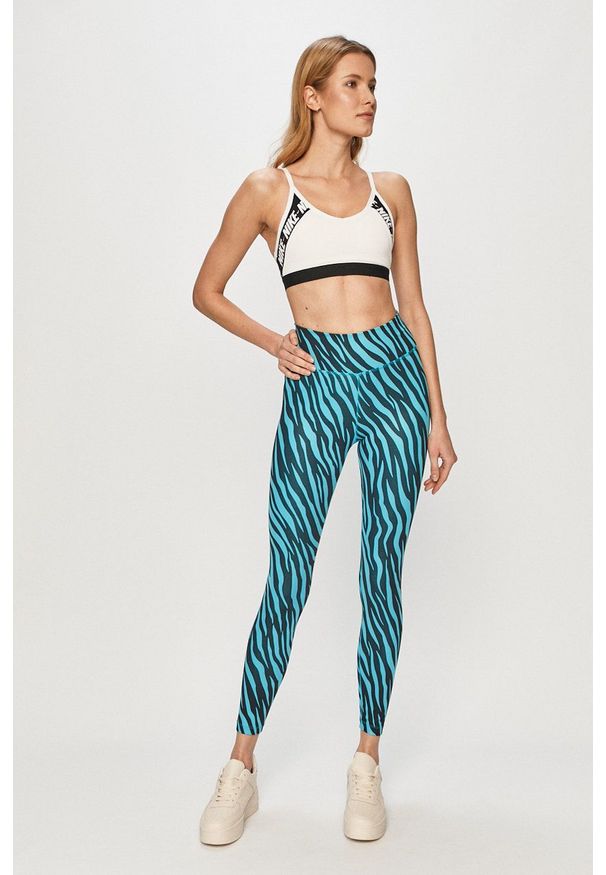 Nike - Legginsy. Stan: podwyższony. Kolor: niebieski. Materiał: tkanina, dzianina, skóra, włókno. Technologia: Dri-Fit (Nike)