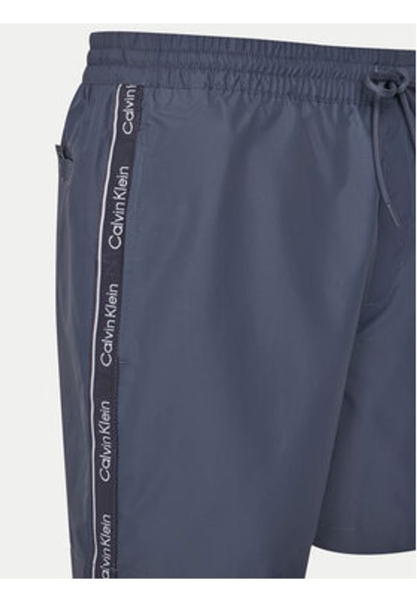 Calvin Klein Swimwear Szorty kąpielowe KM0KM01109 Niebieski Regular Fit. Kolor: niebieski. Materiał: syntetyk