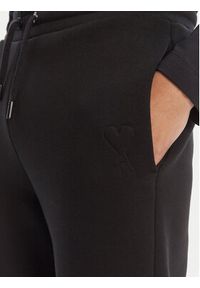 AMI PARIS Spodnie dresowe UTR237.749 Czarny Relaxed Fit. Kolor: czarny. Materiał: syntetyk