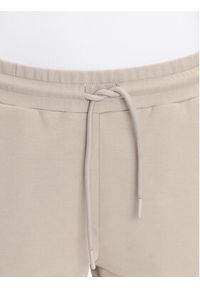 EA7 Emporio Armani Spodnie dresowe 7W000489 AF12951 U6155 Beżowy Regular Fit. Kolor: beżowy. Materiał: bawełna #4