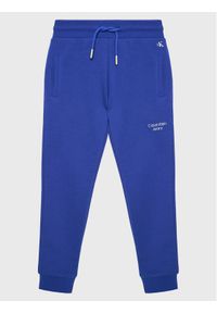 Calvin Klein Jeans Spodnie dresowe Stack Logo IB0IB01282 Granatowy Regular Fit. Kolor: niebieski. Materiał: bawełna #1