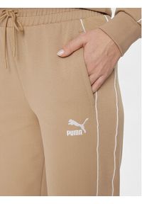 Puma Spodnie dresowe T7 624212 Beżowy Relaxed Fit. Kolor: beżowy. Materiał: bawełna