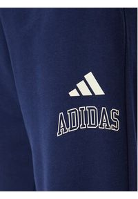 Adidas - adidas Spodnie dresowe Seasonal Essentials Collegiate French Terry Cuffed KG0521 Granatowy Regular Fit. Kolor: niebieski. Materiał: bawełna #2