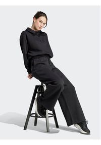 Adidas - adidas Spodnie dresowe IR8377 Czarny Loose Fit. Kolor: czarny. Materiał: bawełna, dresówka #6