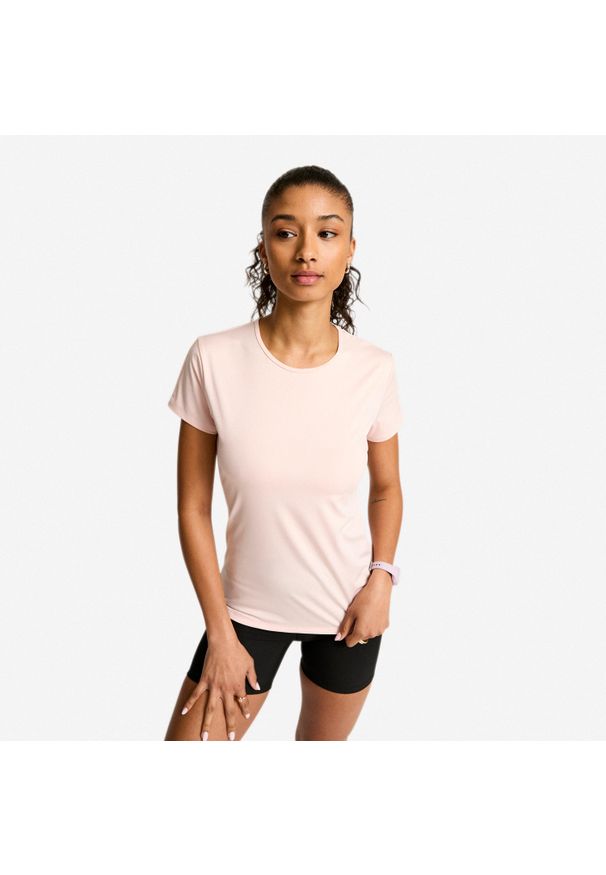 DOMYOS - Koszulka fitness damska Domyos krótki rękaw. Kolor: różowy. Materiał: poliester, elastan, materiał. Długość rękawa: krótki rękaw. Długość: krótkie. Sport: fitness