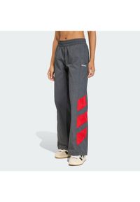 Adidas - adidas Spodnie dresowe Blocked Washed KE5037 Szary Loose Fit. Kolor: szary. Materiał: syntetyk #1