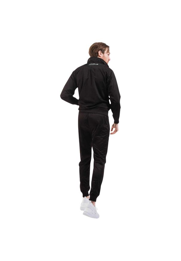 Dres Givova Tuta Visa Black. Kolor: biały, czarny, wielokolorowy. Materiał: dresówka