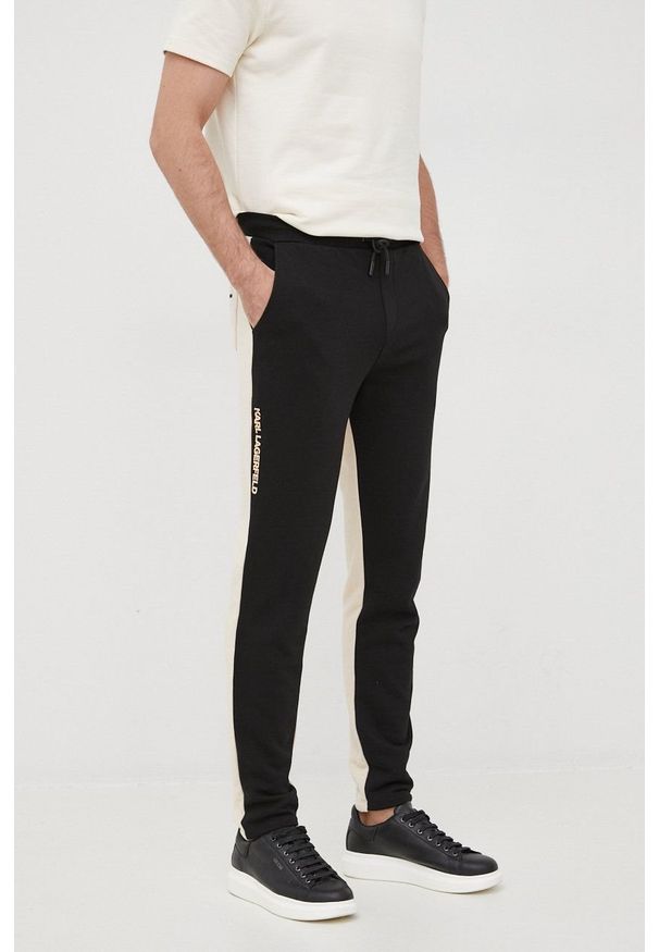 Karl Lagerfeld spodnie dresowe 521900.705022 męskie kolor czarny wzorzyste. Kolor: czarny. Materiał: dresówka