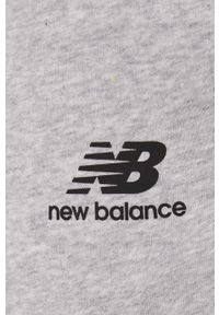 New Balance spodnie dresowe MP21503AG męskie kolor szary melanżowe. Kolor: szary. Materiał: dresówka. Wzór: melanż #4