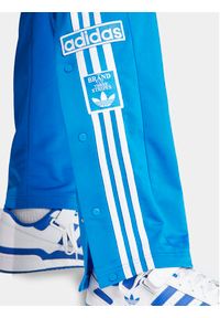 Adidas - adidas Spodnie dresowe adicolor Classics Adibreak IM8224 Niebieski Regular Fit. Kolor: niebieski. Materiał: syntetyk #5