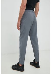 Reebok spodnie treningowe Workout Ready męskie kolor szary gładkie. Kolor: szary. Materiał: poliester, materiał. Wzór: gładki #5