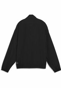 Puma - Damska kurta Style PUMA Black. Typ kołnierza: kołnierzyk stójkowy. Kolor: czarny. Materiał: guma. Wzór: nadruk