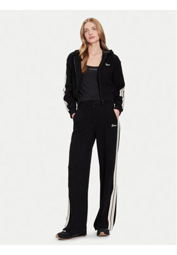 Guess Spodnie dresowe V5BB16 KCX52 Czarny Wide Leg. Kolor: czarny. Materiał: syntetyk
