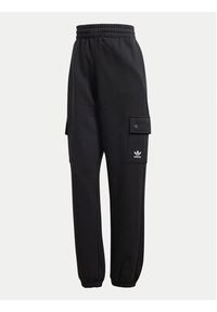 Adidas - adidas Spodnie dresowe Essentials IT7576 Czarny Loose Fit. Kolor: czarny. Materiał: bawełna, syntetyk #6
