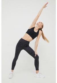 Calvin Klein Performance biustonosz sportowy Seamless kolor czarny gładki. Kolor: czarny. Materiał: skóra, materiał. Rodzaj stanika: wyciągane miseczki. Wzór: gładki. Sport: fitness, taniec #5