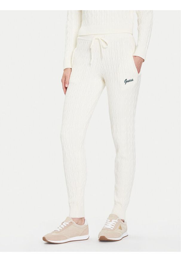 Guess Spodnie dzianinowe V5BB20 Z0572 Beżowy Regular Fit. Kolor: beżowy. Materiał: syntetyk