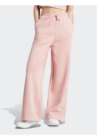 Adidas - adidas Spodnie dresowe IR8378 Różowy Loose Fit. Kolor: różowy. Materiał: bawełna #1