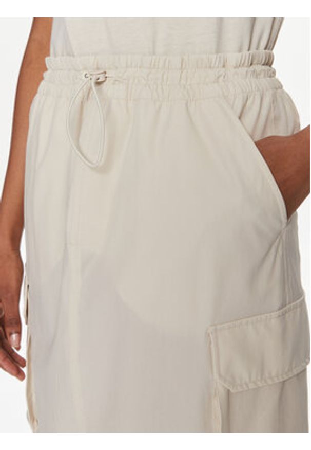 Tommy Jeans Spódnica midi Parachute DW0DW17719 Beżowy Relaxed Fit. Kolor: beżowy. Materiał: syntetyk