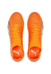 Buty piłkarskie Puma Ultra Match It M 107221 01 pomarańczowe pomarańcze i czerwienie. Kolor: pomarańczowy. Materiał: guma. Sport: piłka nożna