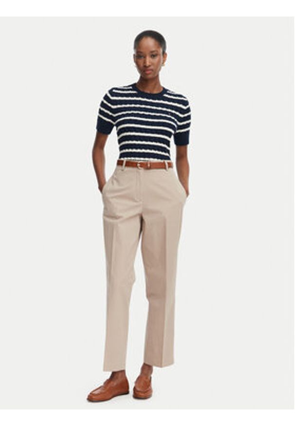 TOMMY HILFIGER - Tommy Hilfiger Chinosy WW0WW52817 Beżowy Slim Fit. Kolor: beżowy. Materiał: syntetyk