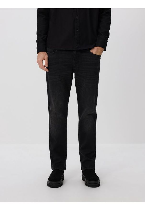 Reserved - Jeansy slim z efektem sprania - czarny. Kolor: czarny