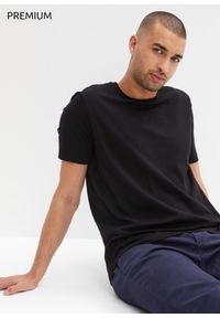 bonprix - T-shirt bezszwowy z kolekcji Essential, z bawełny organicznej. Kolor: czarny. Materiał: bawełna