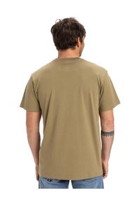 Quiksilver - Koszulka z krótkim rękawem dla Mężczyzn EV SUN DAGGER Beżowy. Kolor: beżowy. Materiał: jersey, bawełna. Długość rękawa: krótki rękaw. Długość: krótkie. Wzór: nadruk
