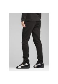 Puma - Męskie spodnie Evostripe Core PUMA Black. Kolor: czarny