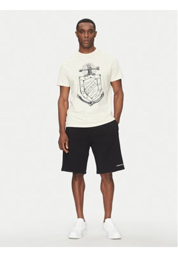 Guess T-Shirt M5GI72 KBW41 Beżowy Regular Fit. Kolor: beżowy. Materiał: bawełna