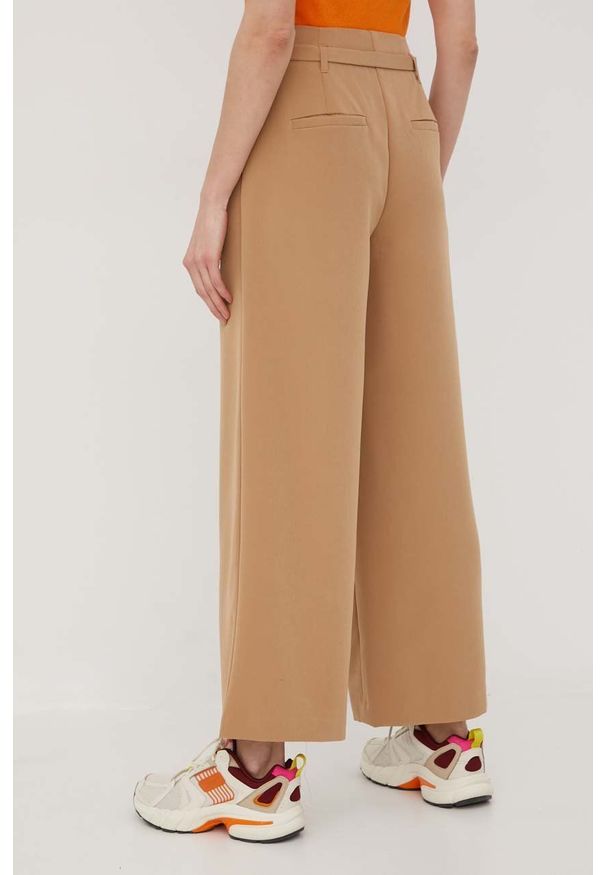 only - Only spodnie damskie kolor beżowy szerokie high waist. Stan: podwyższony. Kolor: beżowy