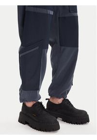 G-Star RAW - G-Star Raw Spodnie materiałowe Tone On Tone D27036-D522 Niebieski Relaxed Fit. Kolor: niebieski. Materiał: wiskoza