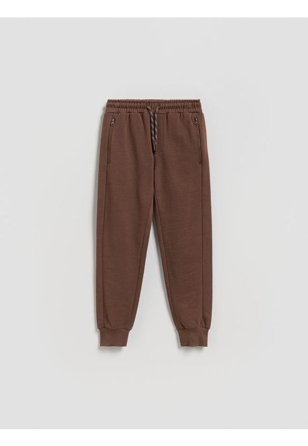 Reserved - Bawełniane joggery - ciemnobrązowy. Kolor: brązowy. Materiał: bawełna