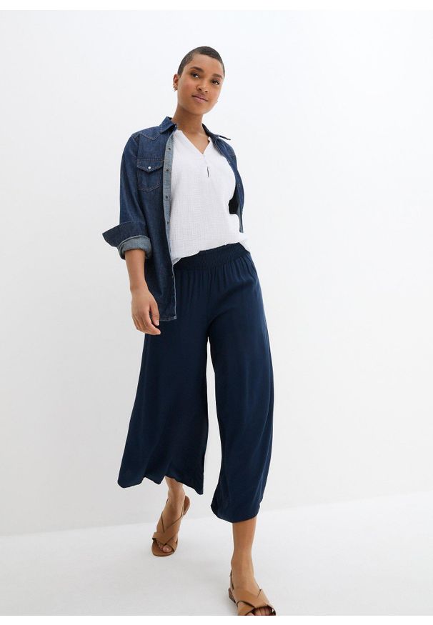 bonprix - Spodnie culotte w długości do łydki, z miękkiej wiskozy. Kolor: niebieski. Materiał: wiskoza. Styl: elegancki
