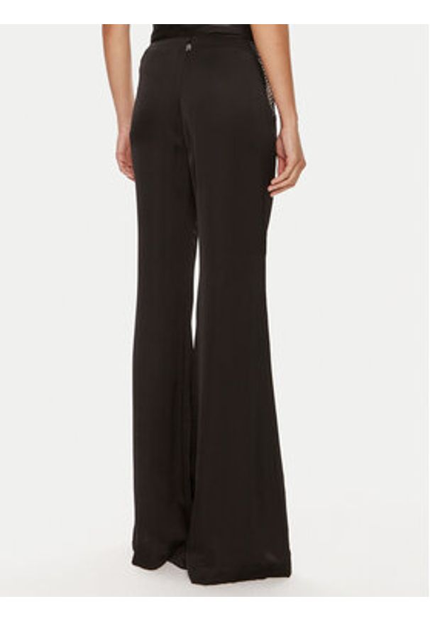 ROTATE Spodnie materiałowe Malou 112538100 Czarny Slim Fit. Kolor: czarny. Materiał: wiskoza