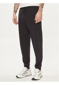 GAP - Gap Spodnie dresowe 868463-03 Czarny Regular Fit. Kolor: czarny. Materiał: bawełna #1