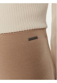 Calvin Klein Spodnie dresowe K20K207680 Beżowy Relaxed Fit. Kolor: beżowy. Materiał: wełna