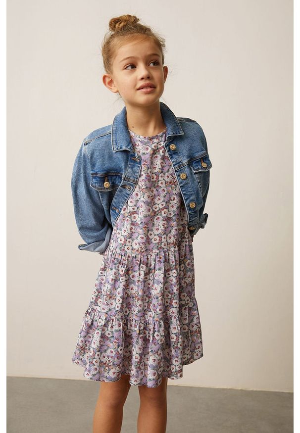 Mango Kids - Sukienka dziecięca ODETTE. Kolor: fioletowy. Materiał: tkanina, wiskoza. Długość rękawa: długi rękaw. Typ sukienki: rozkloszowane. Długość: mini