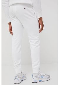 Champion spodnie Rib Cuff męskie kolor biały z aplikacją. Kolor: biały. Materiał: dzianina. Wzór: aplikacja