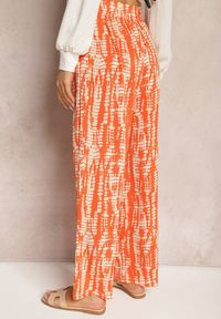 Renee - Pomarańczowe Spodnie z Szerokimi Nogawkami z Abstrakcyjnym Wzorem i Gumką w Pasie Sarieta. Kolor: pomarańczowy #4