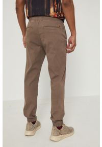 medicine - Medicine Spodnie męskie kolor brązowy joggery. Kolor: brązowy. Materiał: tkanina. Wzór: gładki #3