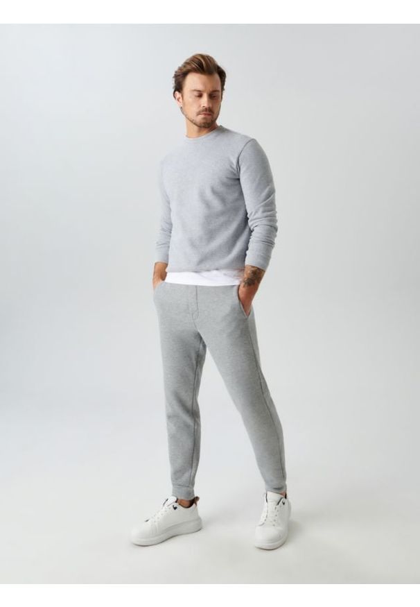 Sinsay - Spodnie dresowe jogger - szary. Kolor: szary. Materiał: dresówka