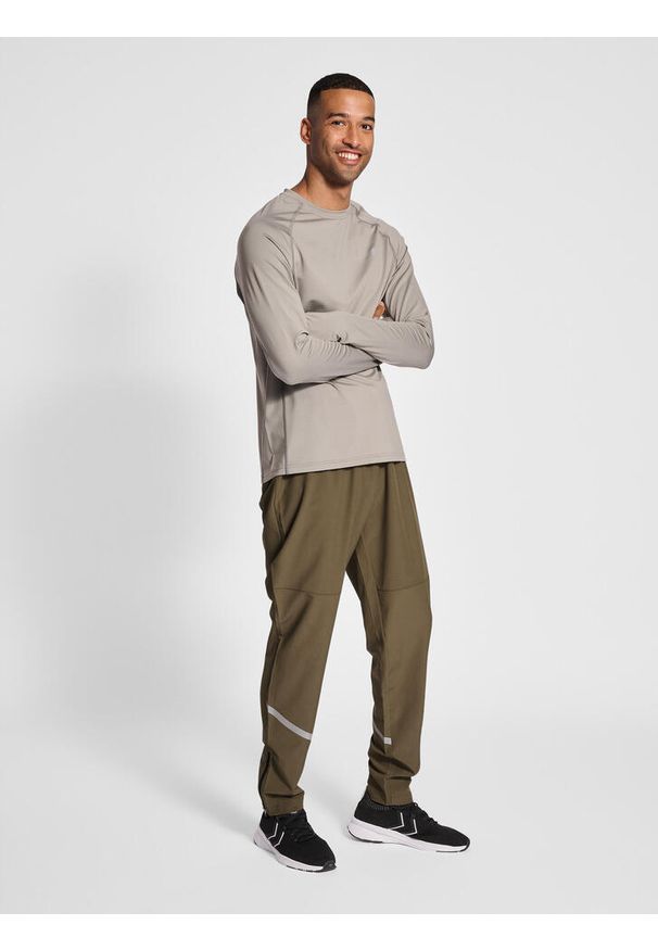 NewLine - Jogging Newline Portland. Kolor: brązowy, zielony, wielokolorowy. Materiał: dresówka. Styl: sportowy