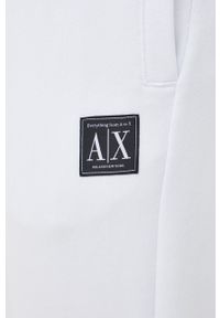 Armani Exchange spodnie dresowe bawełniane męskie kolor biały gładkie. Kolor: biały. Materiał: bawełna, dresówka. Wzór: gładki