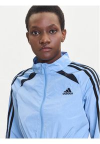 Adidas - adidas Bluza Teamgeist adicolor JZ8277 Błękitny Slim Fit. Kolor: niebieski. Materiał: syntetyk