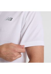 Koszulka męska New Balance MT51519WT – biała. Typ kołnierza: polo. Kolor: biały. Materiał: bawełna, poliester, materiał #2