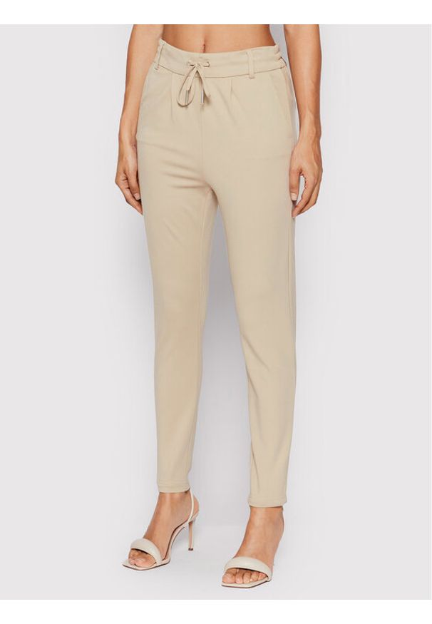 only - ONLY Spodnie materiałowe Poptrash 15115847 Beżowy Slim Fit. Kolor: beżowy. Materiał: syntetyk
