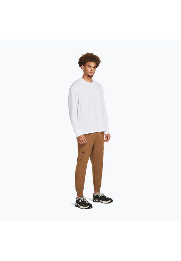 Spodnie dresowe męskie Under Armour UNSTOPPABLE JOGGERS. Kolor: brązowy. Materiał: dresówka
